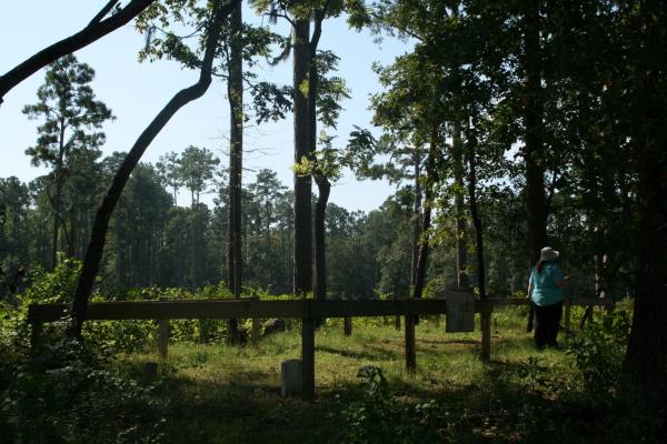 OSA archaeologist records the condition and details of a cemetery at Goose Creek State Park